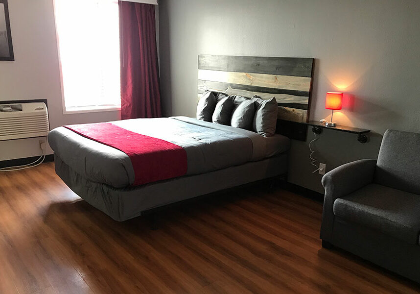 guest room with one king bed