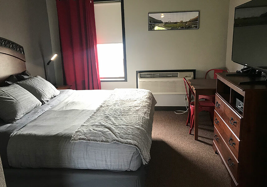 guest room with one king bed