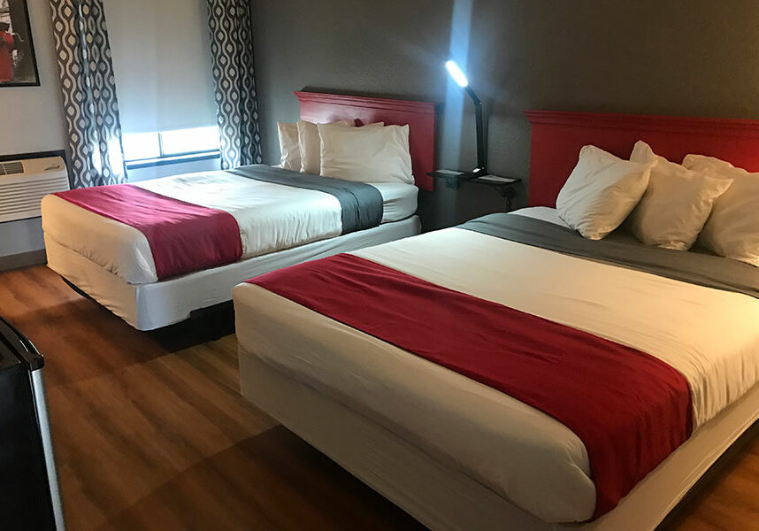 guest room with two queen beds